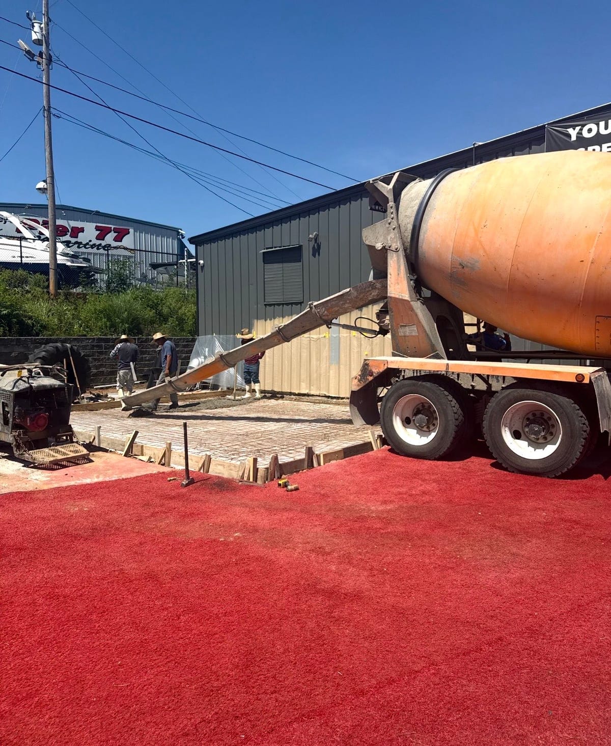 Finished Commercial Concrete job in Charlotte, North Carolina by Local Concrete Co — clean control-joint pattern, smooth troweled surface, full property protection during pour.