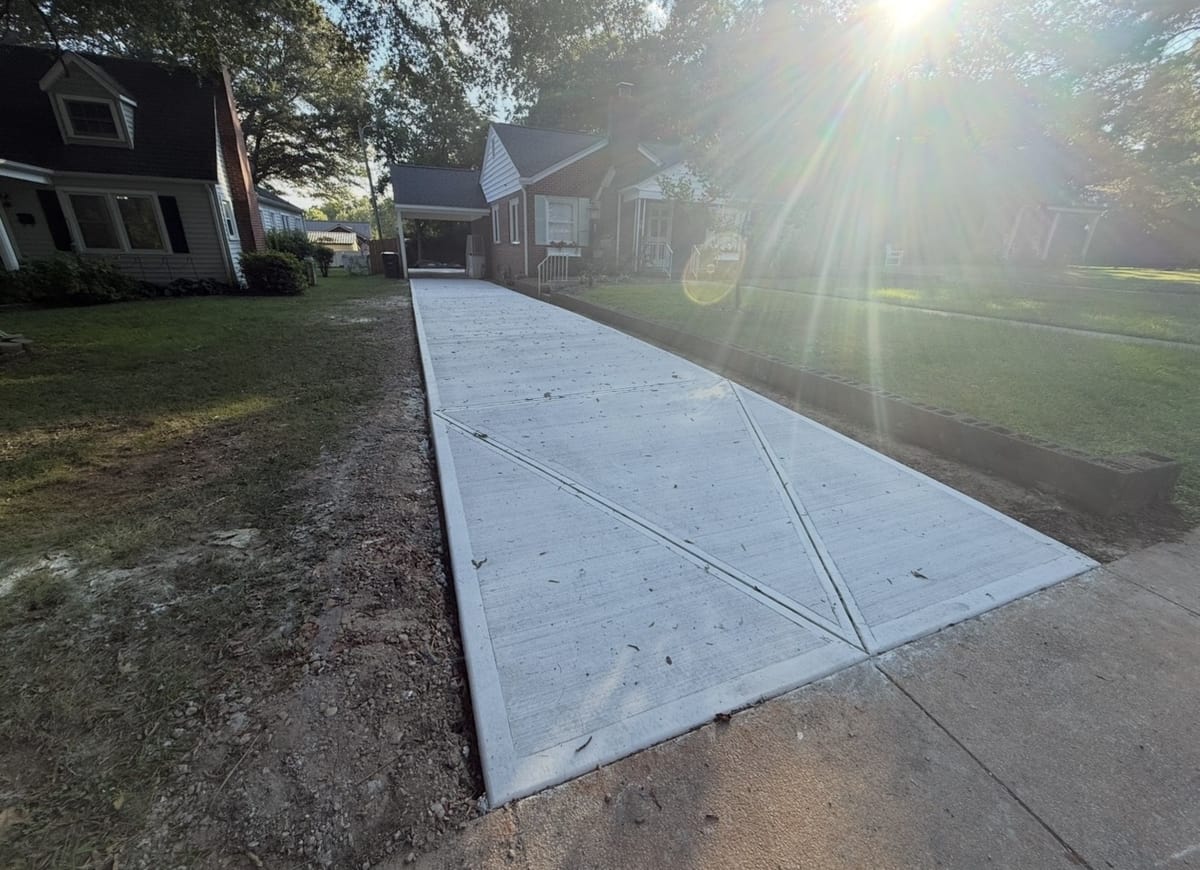Completed Concrete Driveways installation in Cornelius, NC by Local Concrete Co — concrete contractor serving the Charlotte metro and Triangle since 2018, no deposit, no progress payments.