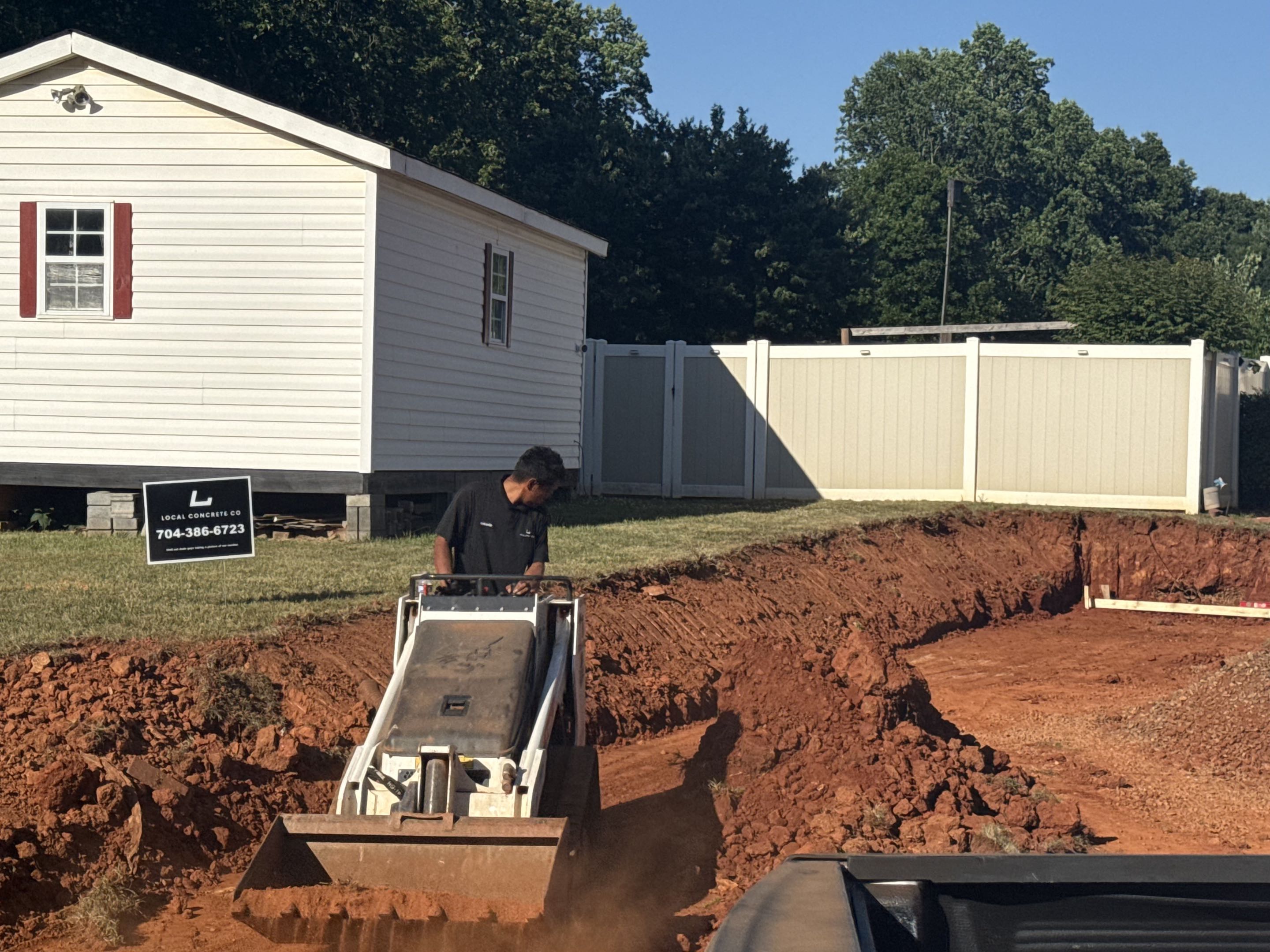 Compacted Base and Laser-Set Forms — step 06 of a Local Concrete Co project in Davidson, NC