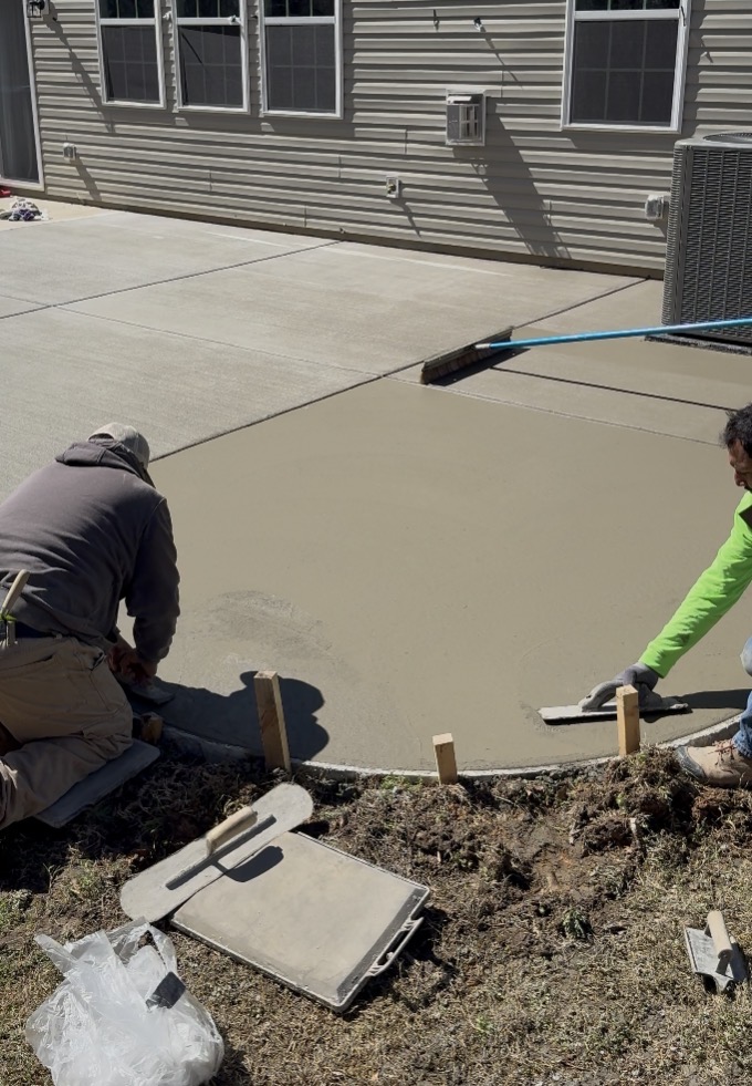 Final Smoothing at the Right Moment — step 13 of a Local Concrete Co project in Davidson, NC